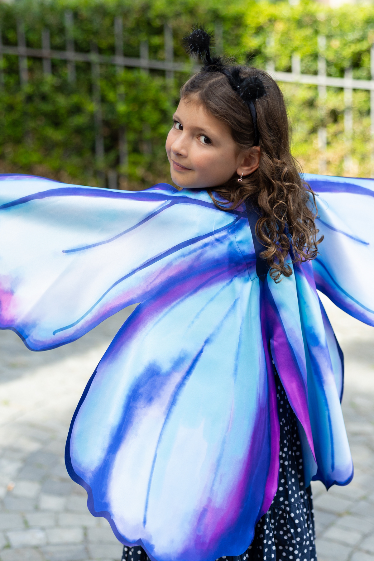 Great Pretenders Blue Monarch Soft Wings – Size 4–6. Clothing, footwear and other accessories shown are not included.