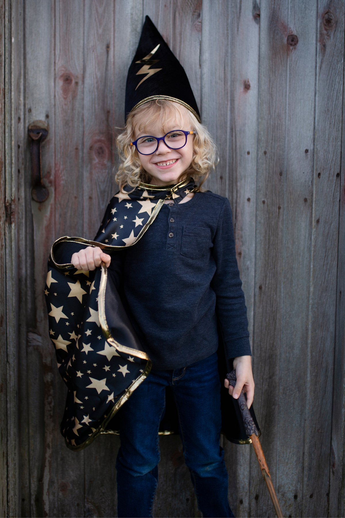 Great Pretenders Reversible Wizard Cape & Hat – Size 4–6. Wand, clothing, glasses and footwear shown are not included.