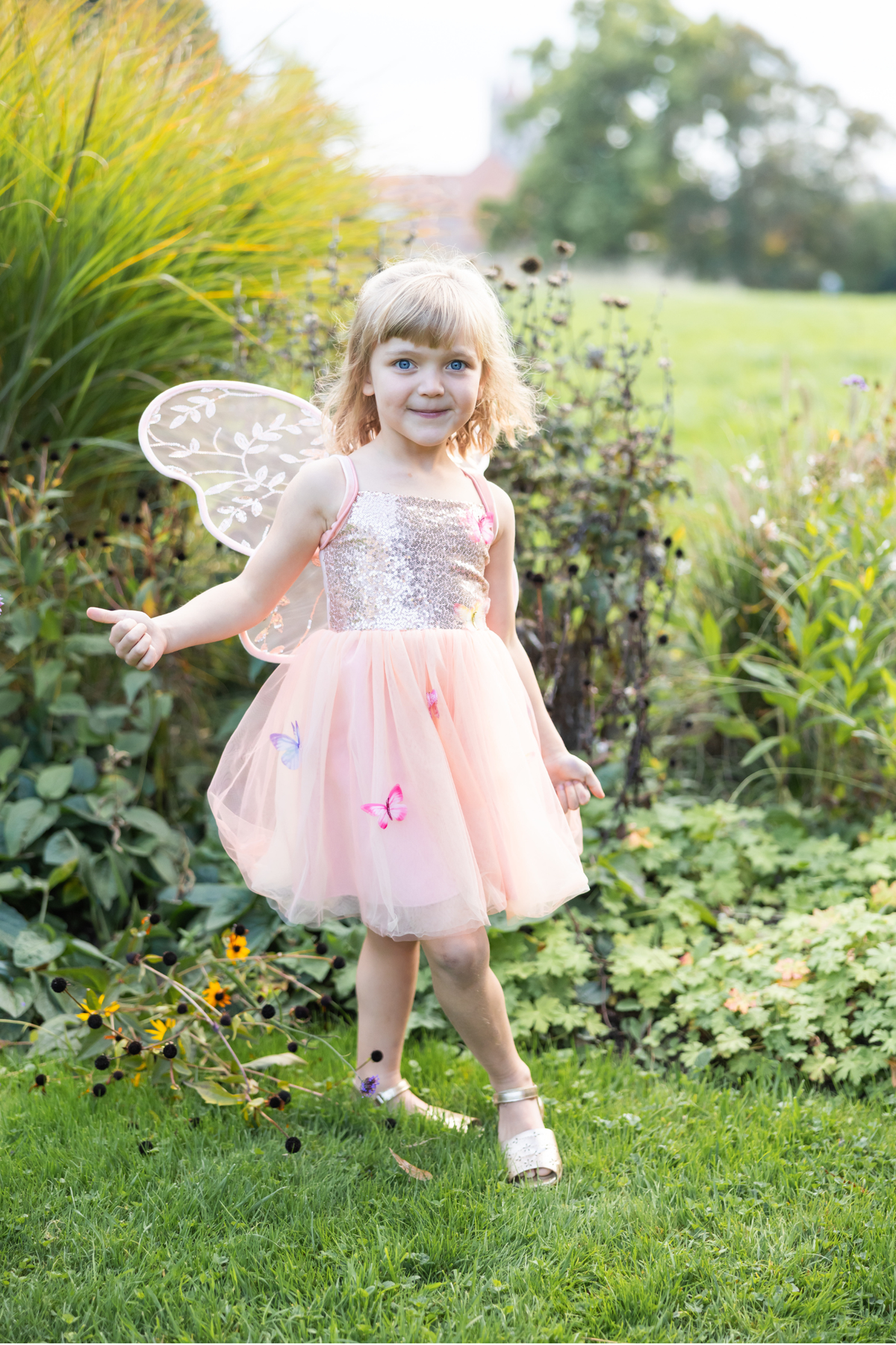 Great Pretenders peach Butterfly Bliss dress; wings shown are sold separately
